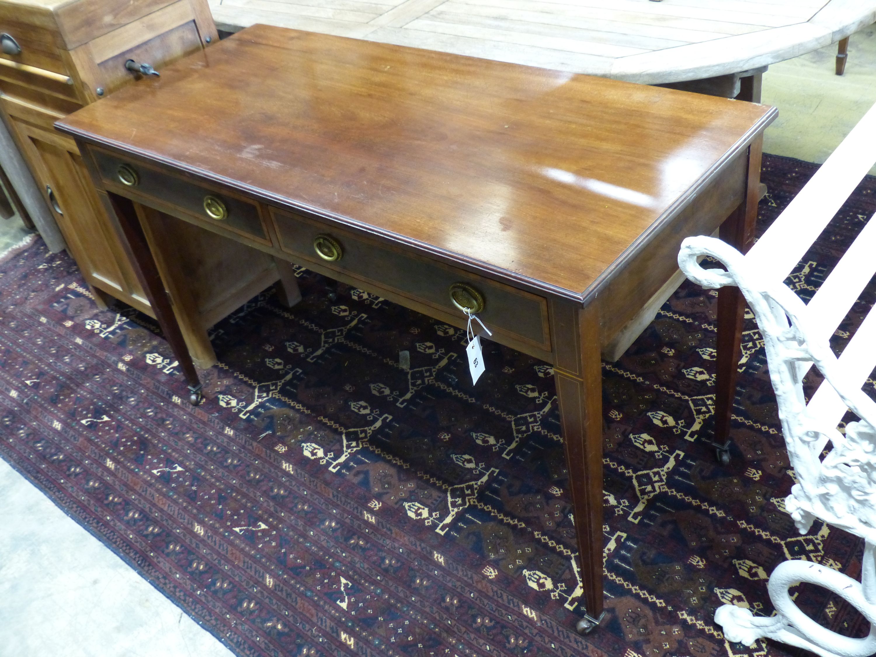 An Edwardian satinwood banded mahogany two drawer side table, width 122cm, depth 54cm, height 76cm